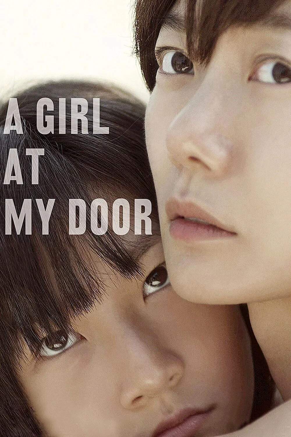 Poster chính thức của phim Phim Tâm Lý "A Girl at My Door" (A Girl at My Door - 2014), với sự tham gia của diễn viên Bae Doona và Kim Sae-ron.