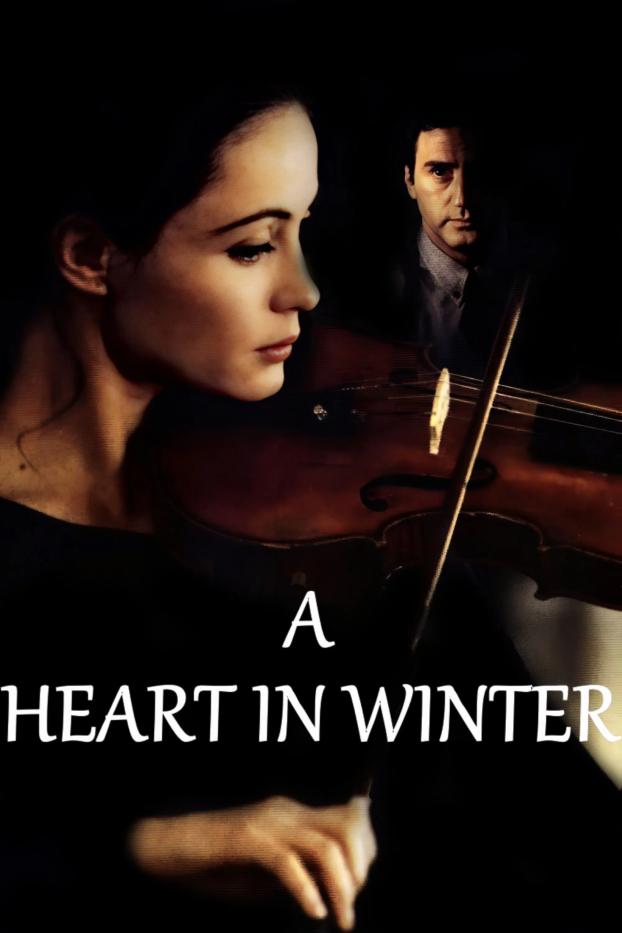 Poster chính thức của phim Phim Tâm Lý, Phim Tình Cảm "Một Trái Tim Mùa Đông" (A Heart in Winter - 1992), với sự tham gia của diễn viên Daniel Auteuil và Emmanuelle Béart.