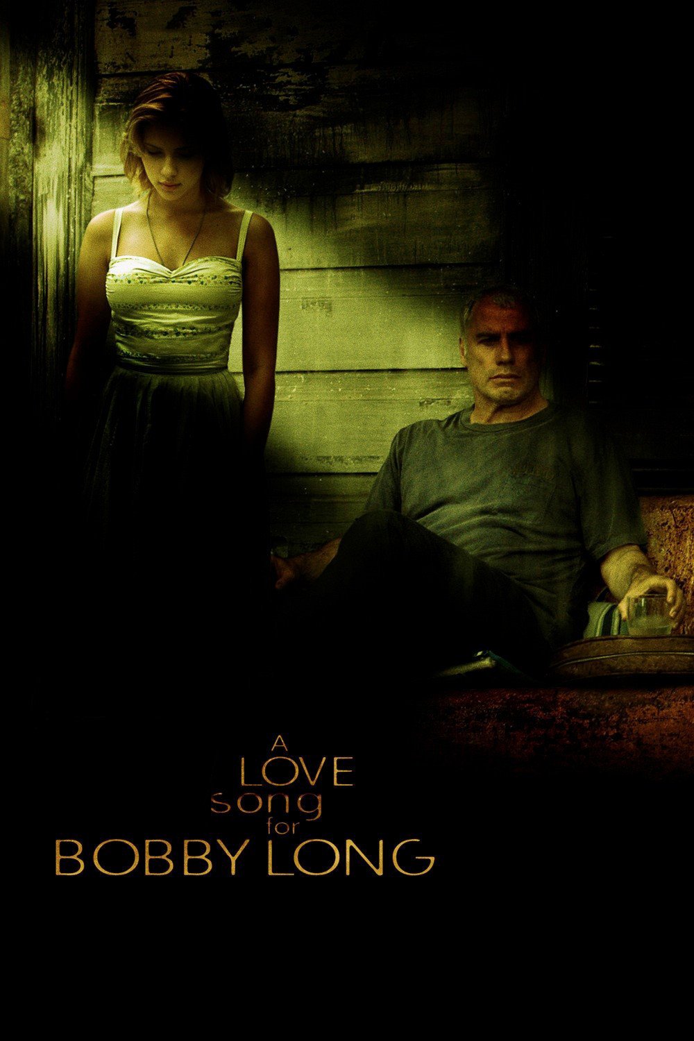 Poster chính thức của phim Phim Tâm Lý "Bản Tình Ca Cho Bobby Long" (A Love Song for Bobby Long - 2004), với sự tham gia của diễn viên John Travolta và Scarlett Johansson.