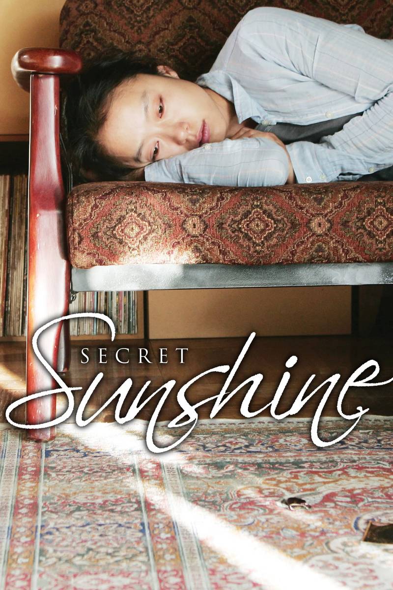 Poster chính thức của phim Phim Tâm Lý "Bí Mật Ánh Dương" (Secret Sunshine - 2007), với sự tham gia của diễn viên Jeon Do-yeon và Song Kang-ho.