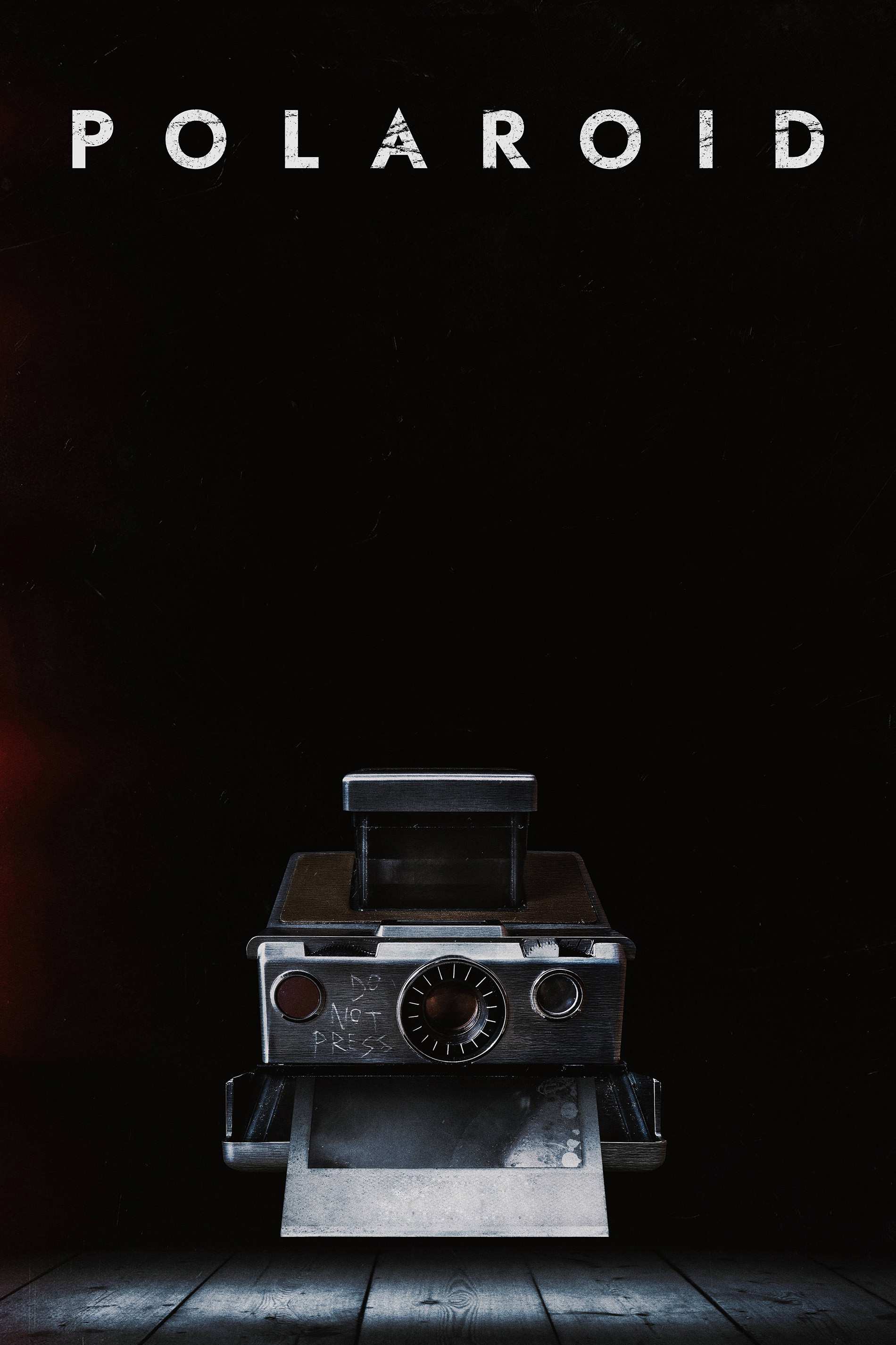 Poster chính thức của phim Phim Kinh Dị, Phim Bí Ẩn "Chiếc Máy Ảnh Chết Chóc" (Polaroid - 2019), với sự tham gia của diễn viên Kathryn Prescott và Tyler Young.