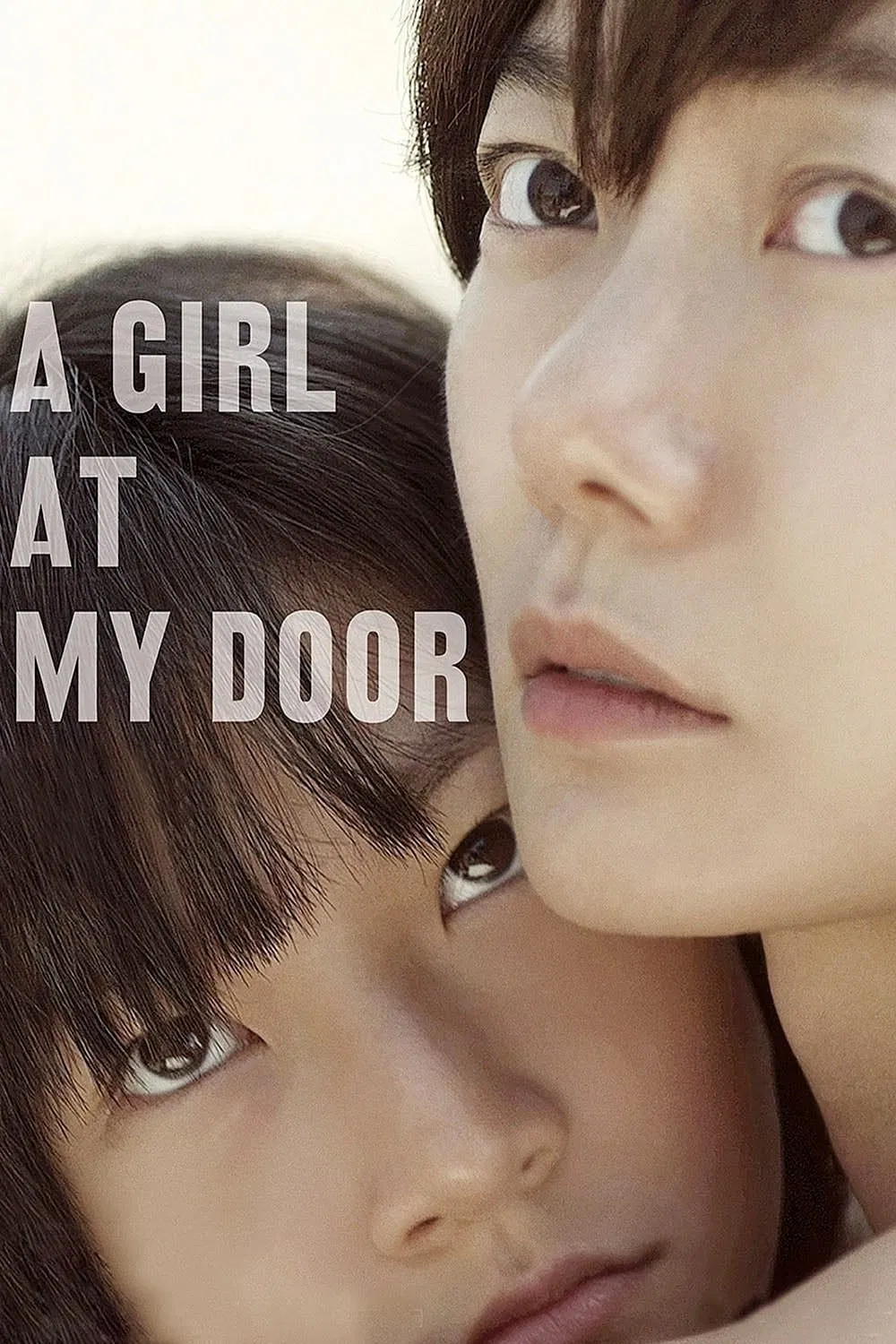 Poster chính thức của phim Phim Tâm Lý "Cô Bé Nhà Bên" (A Girl at My Door - 2014), với sự tham gia của diễn viên Bae Doona và Kim Sae-ron.