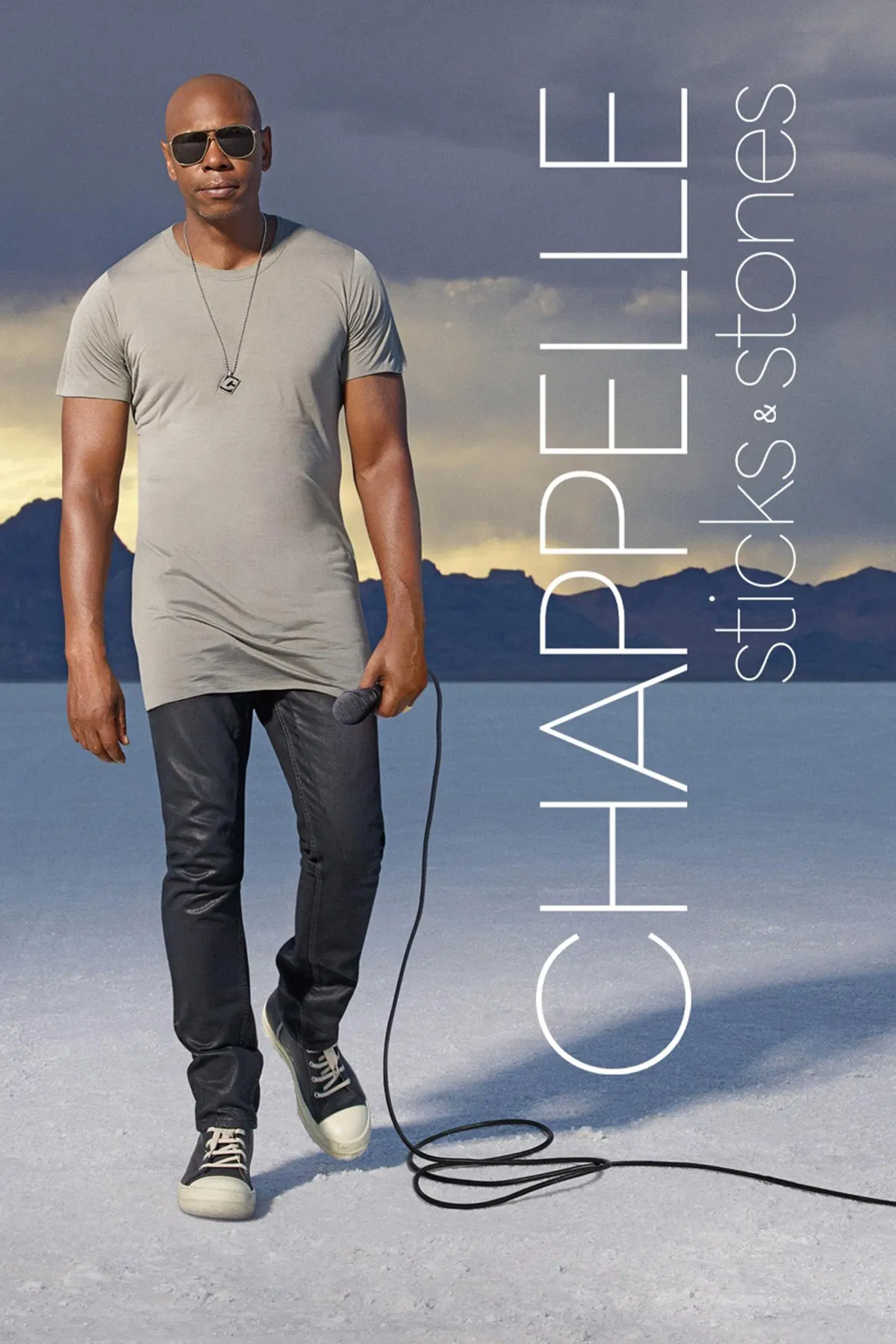 Poster chính thức của phim Phim Hài "Dave Chappelle: Sticks & Stones" (Dave Chappelle: Sticks & Stones - 2019), với sự tham gia của diễn viên Dave Chappelle.