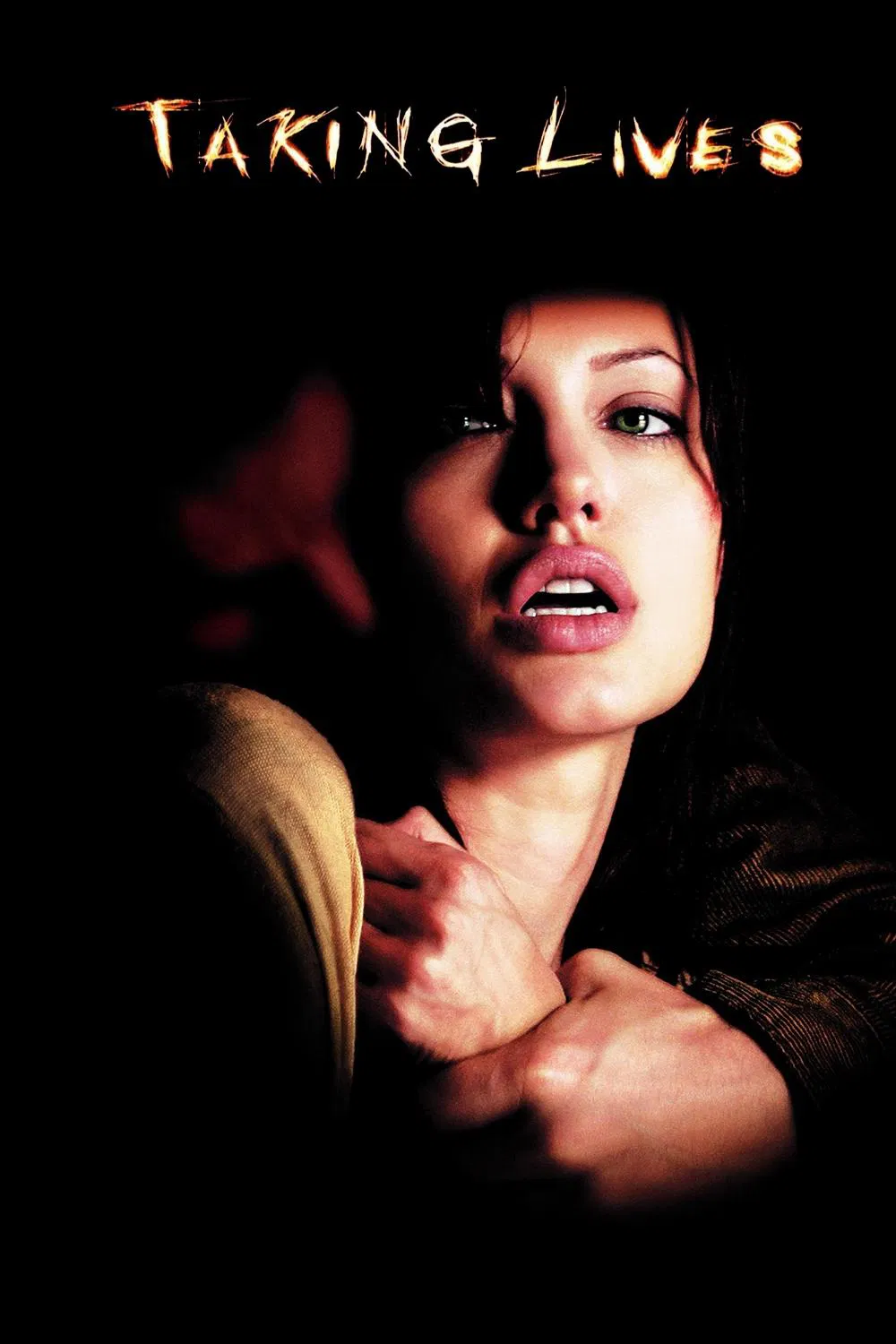 Poster chính thức của phim Phim Giật Gân "Đoạt Mạng" (Taking Lives - 2004), với sự tham gia của diễn viên Angelina Jolie và Ethan Hawke.
