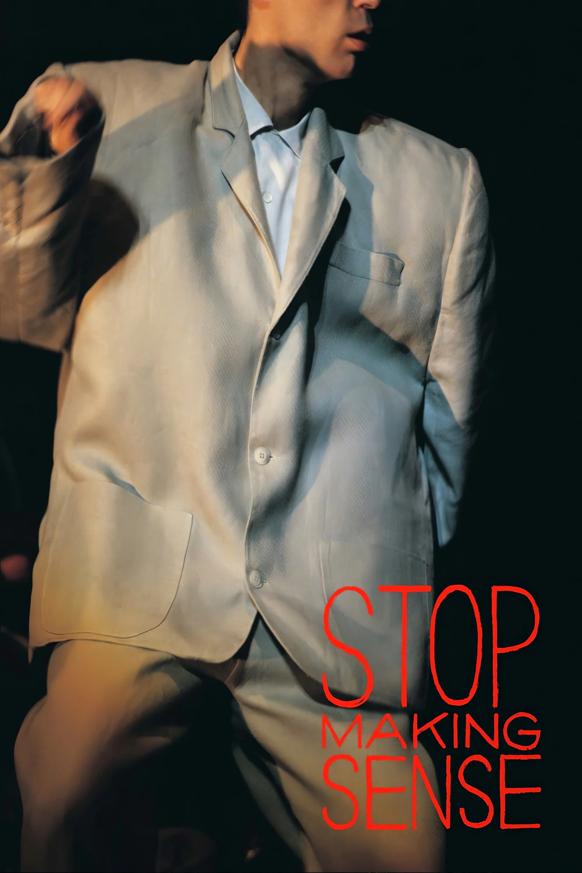 Poster chính thức của phim Phim Tài Liệu, Phim Ca Nhạc "Đừng có ý nghĩa nữa" (Stop Making Sense - 1984), với sự tham gia của diễn viên David Byrne và Chris Frantz.