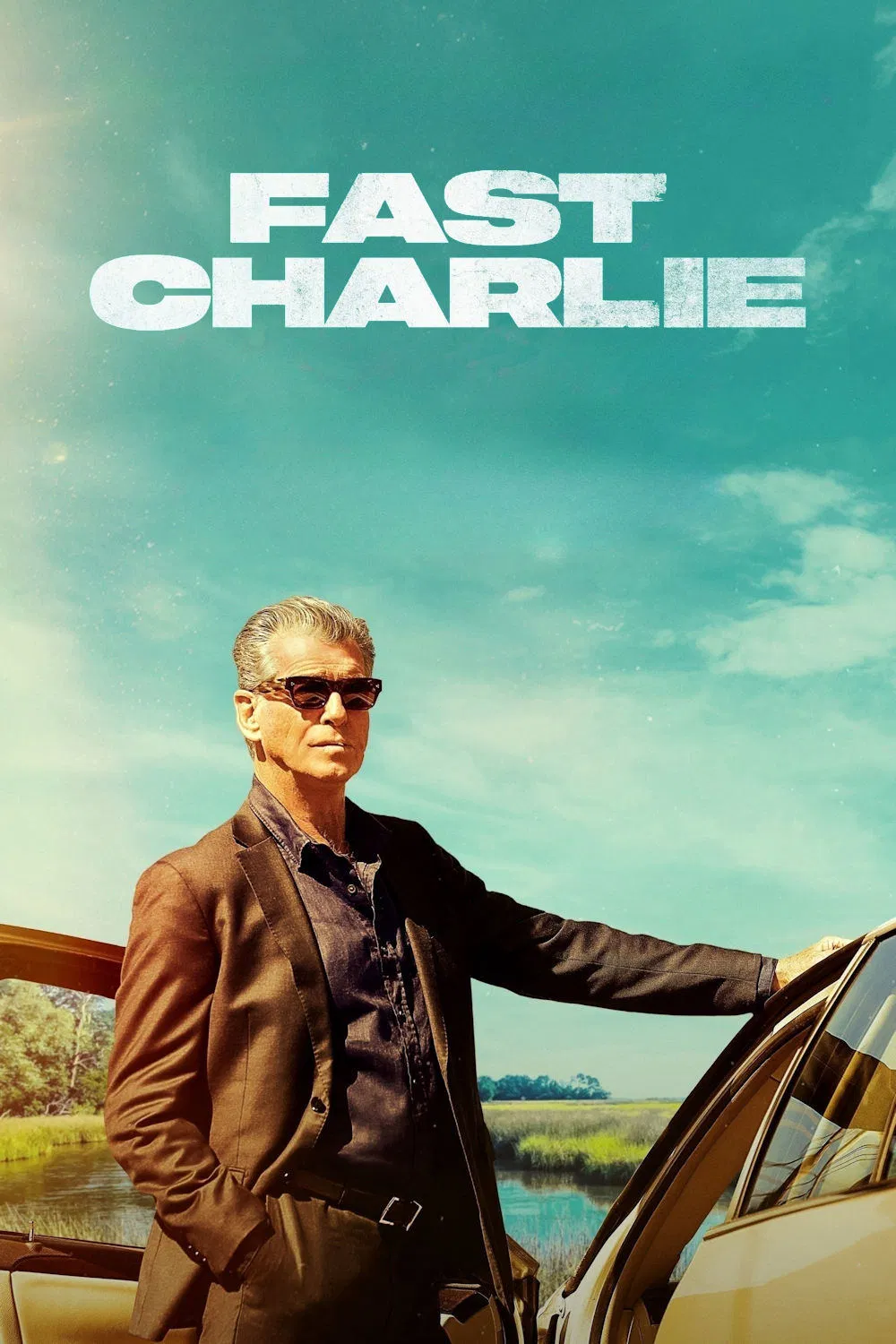 Poster chính thức của phim Phim Hành Động, Phim Hình Sự "Fast Charlie" (Fast Charlie - 2023), với sự tham gia của diễn viên Pierce Brosnan và Morena Baccarin.