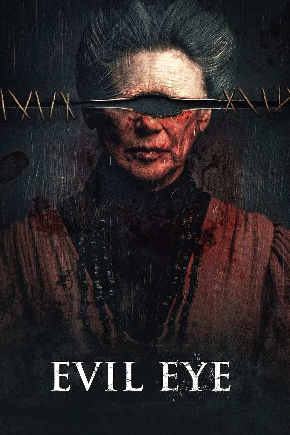 Poster chính thức của phim Phim Kinh Dị "Lời Nguyền Tầm Da" (Evil Eye - 2022), với sự tham gia của diễn viên Ofelia Medina và Paola Miguel.