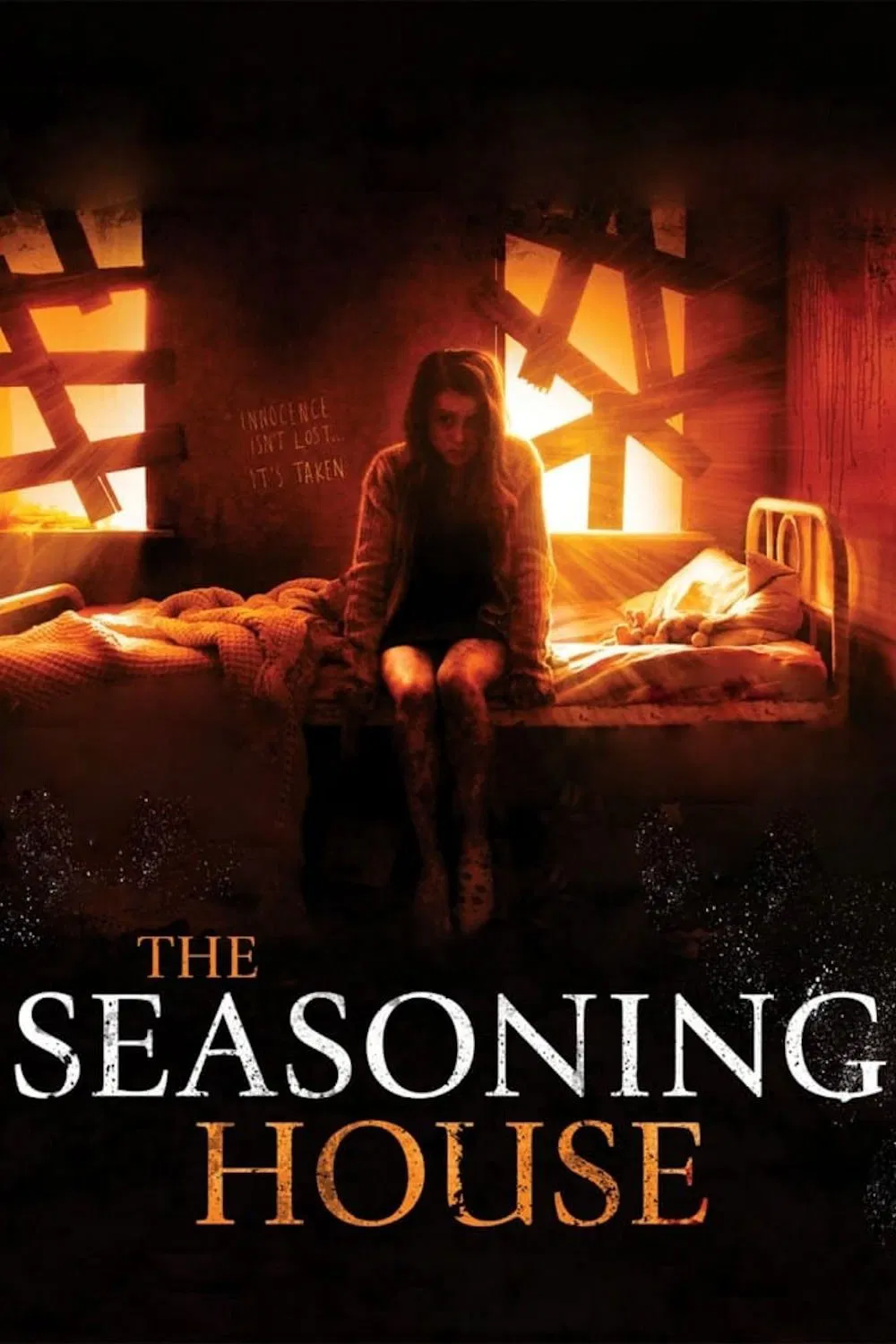 Poster chính thức của phim Phim Kinh Dị "Nhà Chứa Bốn Mùa" (The Seasoning House - 2012), với sự tham gia của diễn viên Rosie Day và Sean Pertwee.