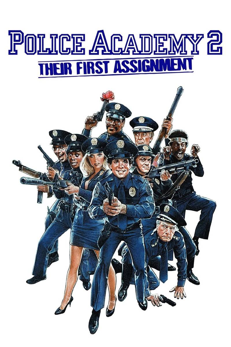Poster chính thức của phim Phim Hài, Phim Hình Sự "Police Academy 2: Their First Assignment" (Police Academy 2: Their First Assignment - 1985), với sự tham gia của diễn viên Steve Guttenberg và Bubba Smith.