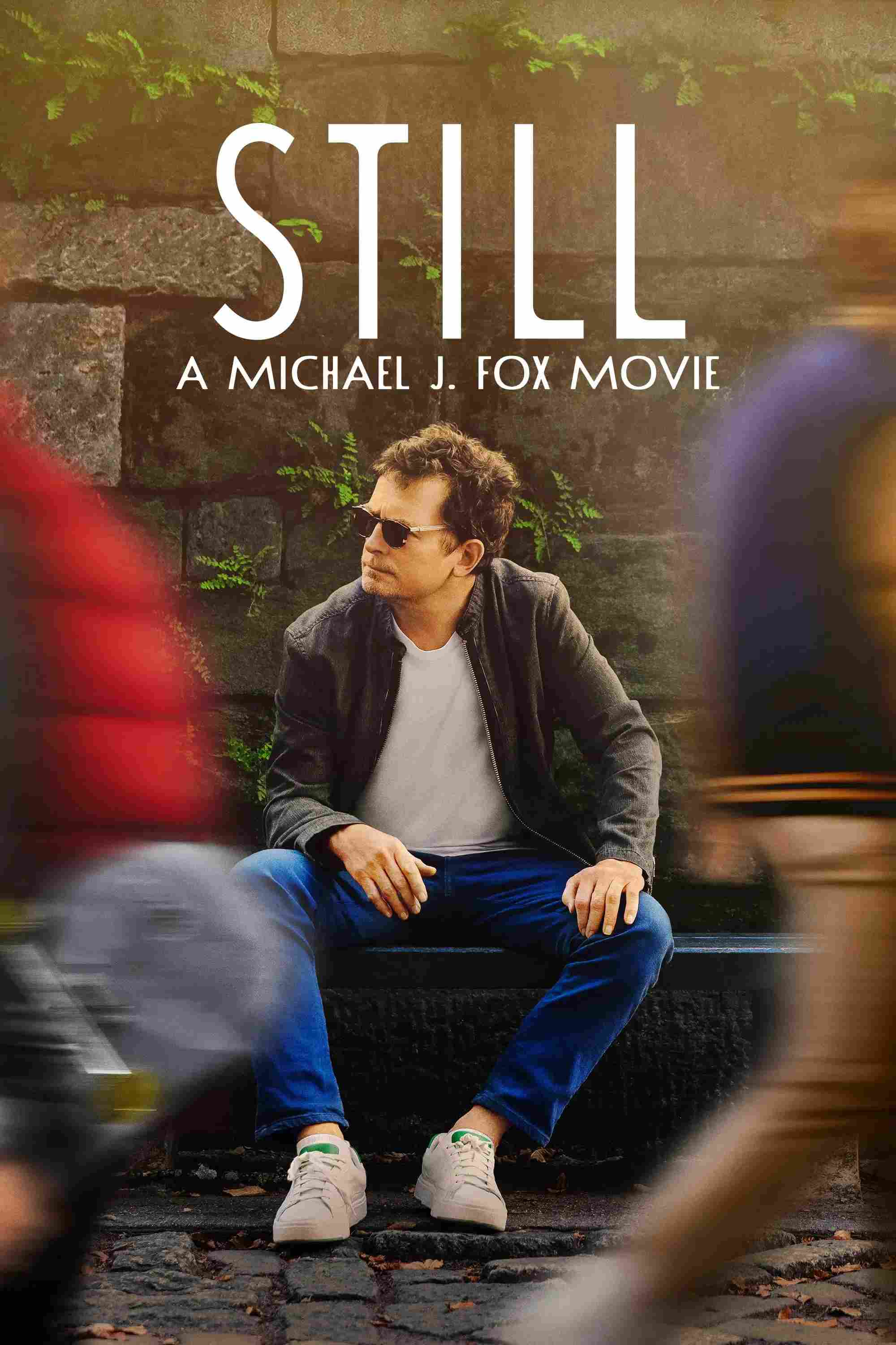 Poster chính thức của phim Phim Tài Liệu "STILL: A Michael J. Fox Movie" (STILL: A Michael J. Fox Movie - 2023), với sự tham gia của diễn viên Michael J. Fox và Tracy Pollan.