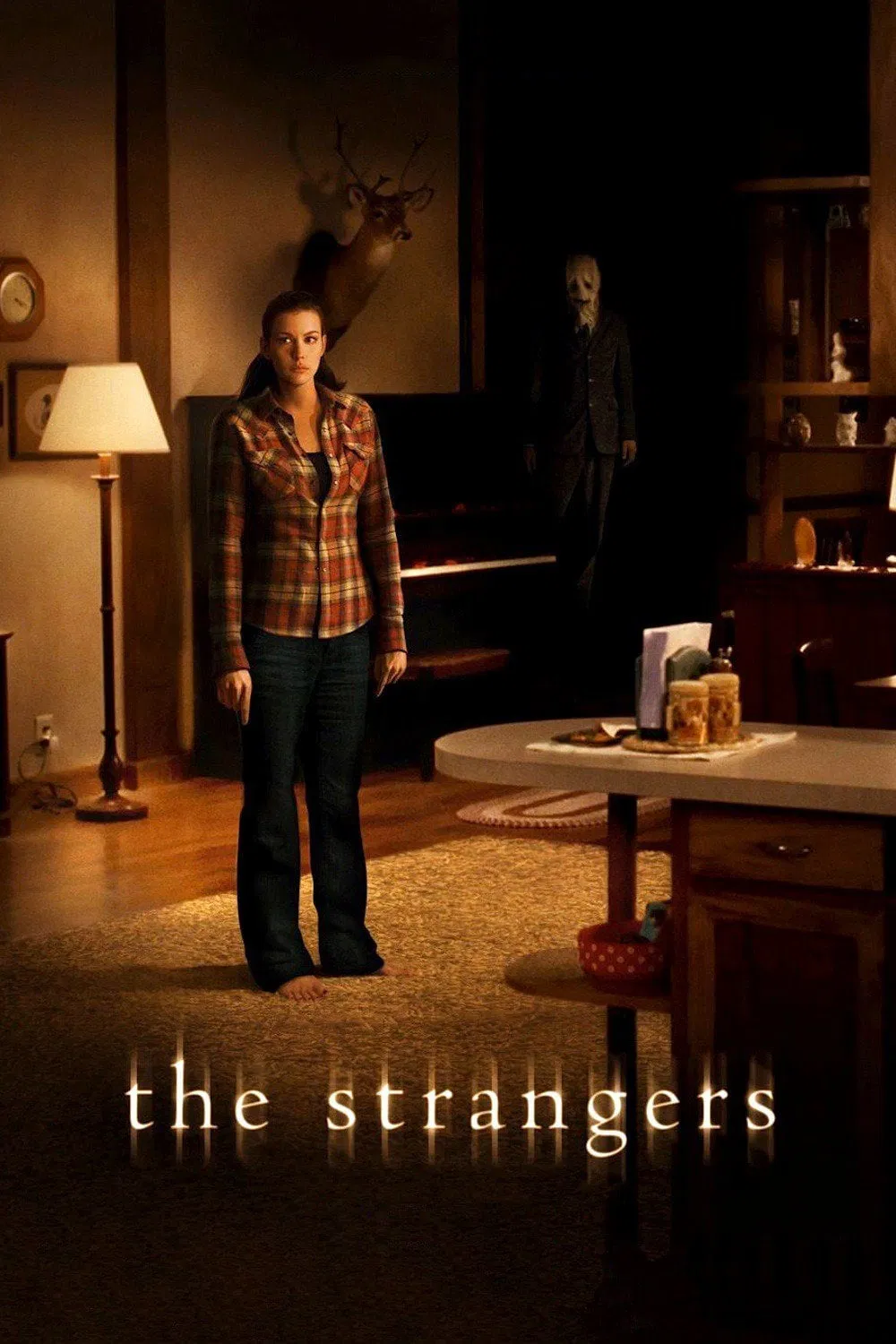 Poster chính thức của phim Phim Kinh Dị, Phim Giật Gân "The Strangers" (The Strangers - 2008), với sự tham gia của diễn viên Liv Tyler và Scott Speedman.