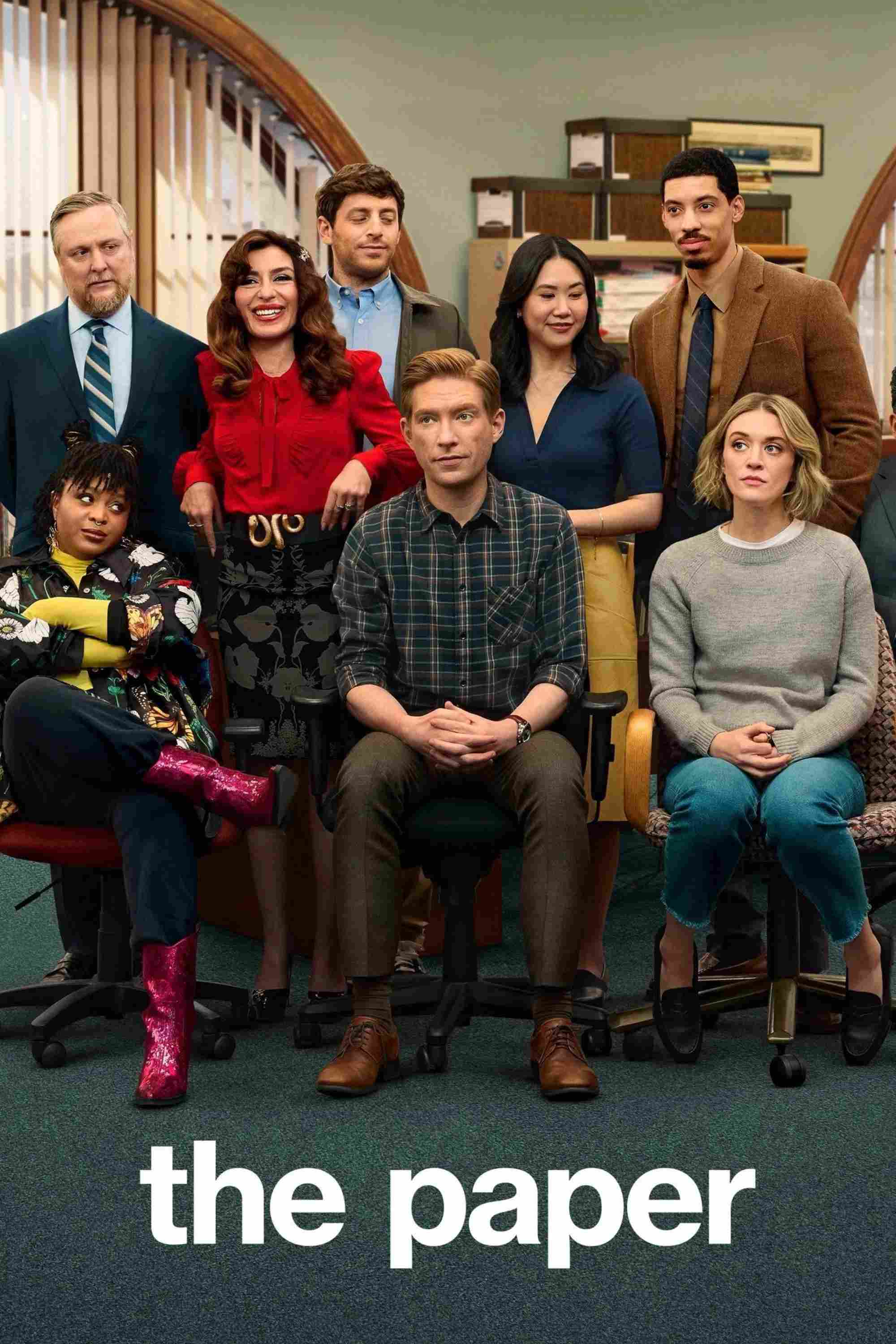 Poster chính thức của phim Phim Hài "Thời Báo" (The Paper - 2025), với sự tham gia của diễn viên Domhnall Gleeson và Sabrina Impacciatore.
