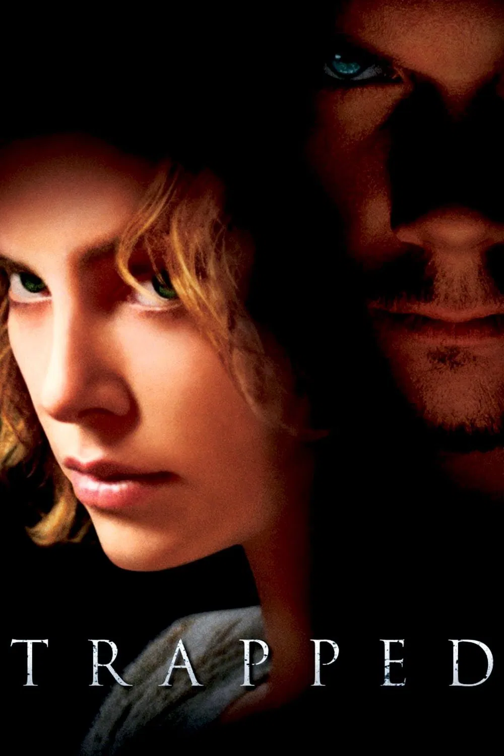 Poster chính thức của phim Phim Giật Gân, Phim Hình Sự "Trapped" (Trapped - 2002), với sự tham gia của diễn viên Charlize Theron và Courtney Love.