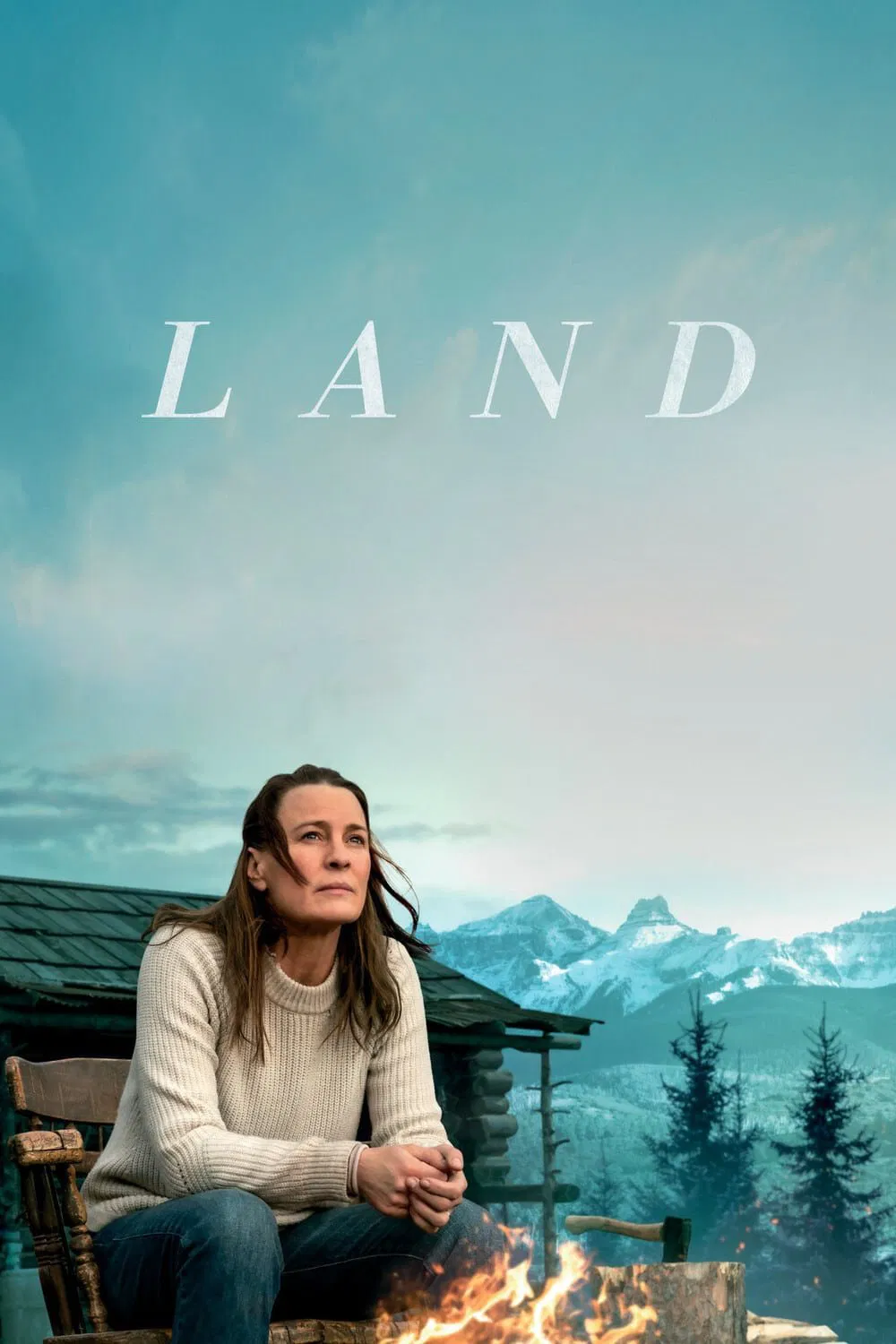 Poster chính thức của phim Phim Tâm Lý "Vùng Đất" (Land - 2021), với sự tham gia của diễn viên Robin Wright và Demián Bichir.